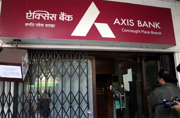 Axis Bank posts Q4 loss at Rs 1,388 crore as provisions nearly treble