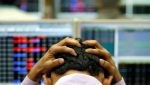 Sensex slips 202 points amid fluctuations